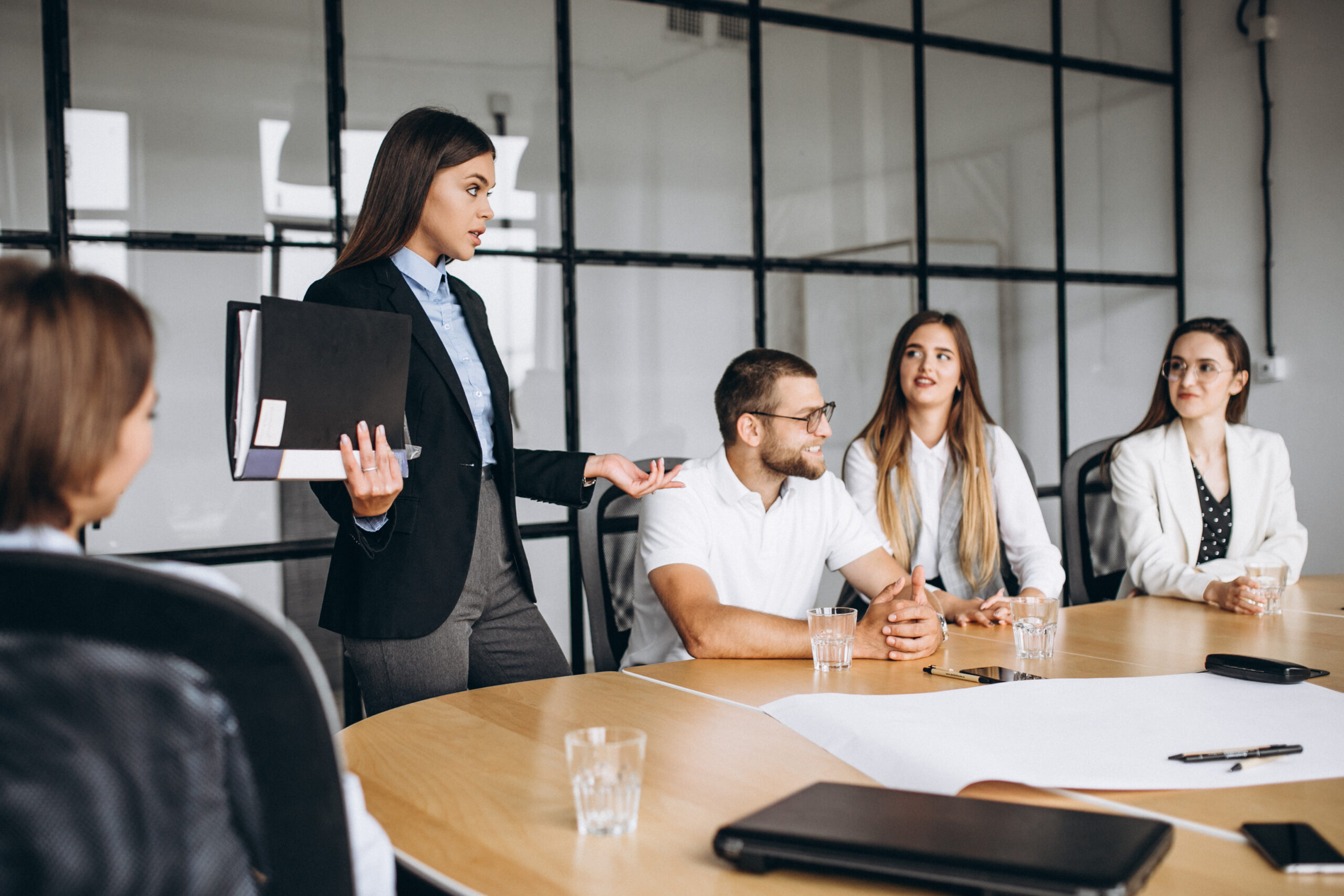 Group of people working out business plan in an office
